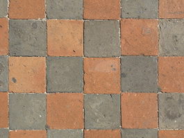 Red and black bricks paving road texture