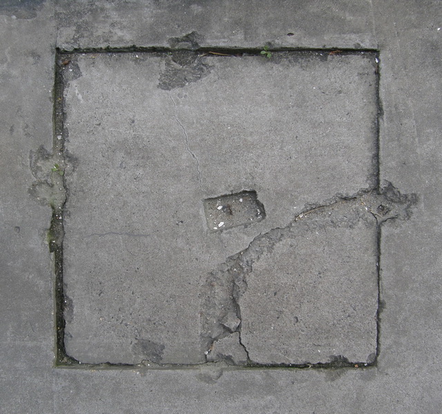 Crack cement manhole cover texture