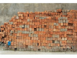 Heap of red bricks texture