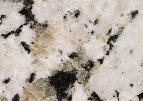 Closeup of venus white granite surface texture