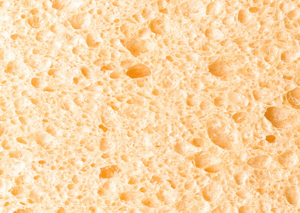 Close-up of orange absorbent paper towel texture