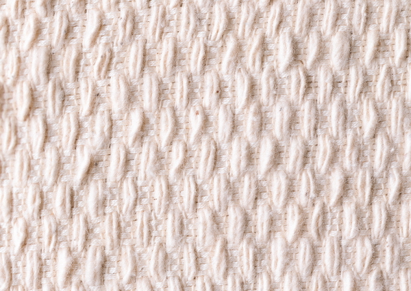 Wool knit cable rug texture